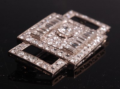 Lot 1108 - A white metal Art Deco diamond panel brooch,...