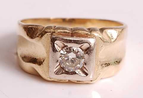 Lot 1111 - A yellow and white metal diamond solitaire...