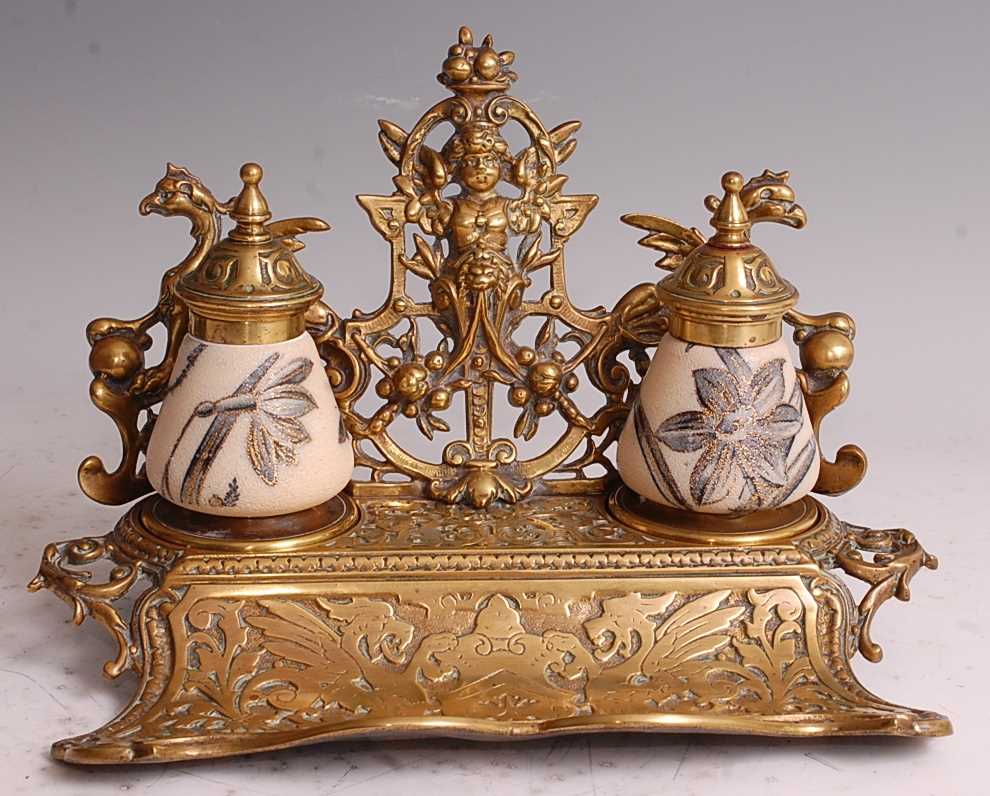 Lot 1199 - A late Victorian heavy gilt brass desk stand,...
