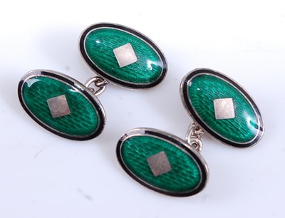 Lot 2526 - A pair of silver and enamel double-ended...