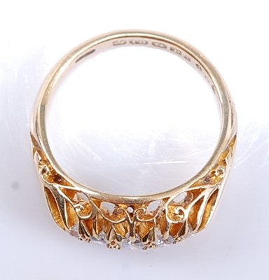 Lot 2527 - An 18ct yellow gold carved head diamond...
