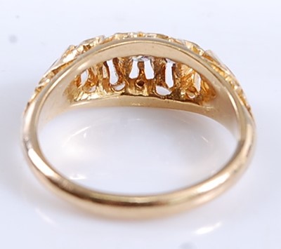 Lot 2527 - An 18ct yellow gold carved head diamond...