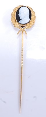 Lot 2535 - A yellow metal hardstone cameo stick pin,...