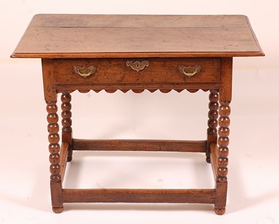 Lot 1398 - A circa 1700 joined oak side table, having a...