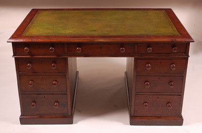 Lot 1408 - A Victorian oak twin pedestal desk, having a...