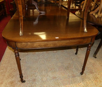 Lot 1283 - A George III mahogany double D-end dining...