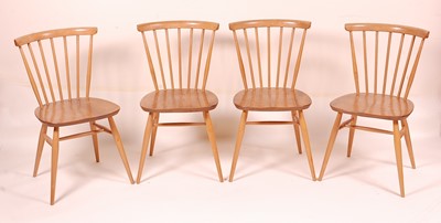 Lot 409 - A set of four Ercol blond elm stickback...