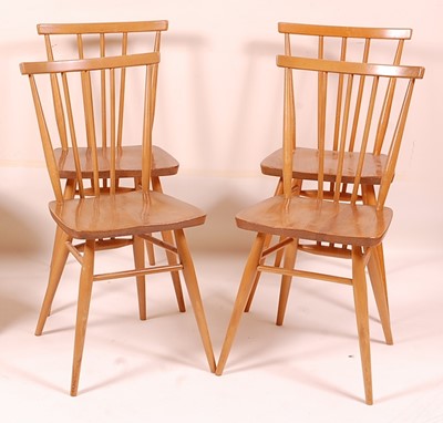 Lot 411 - A set of four Ercol blond elm stickback...