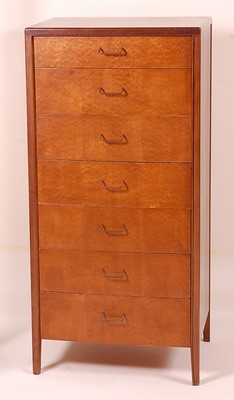 Lot 396 - A 1950s walnut narrow chest of seven long...