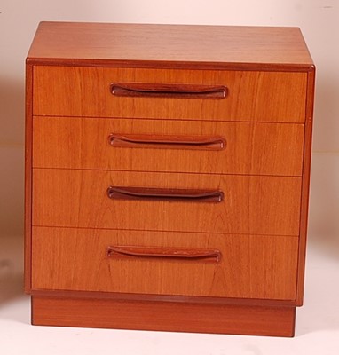 Lot 432 - A 1960s G-Plan teak low chest, of four long...