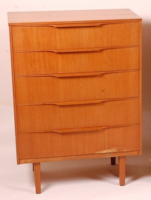 Lot 434 - A 1960s teak chest, of five long drawers with...