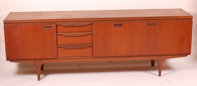 Lot 464 - A 1960s teak long sideboard by Greaves &...