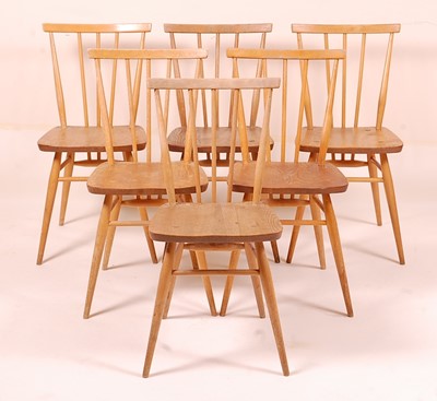 Lot 413 - A set of six Ercol blond elm stickback kitchen...