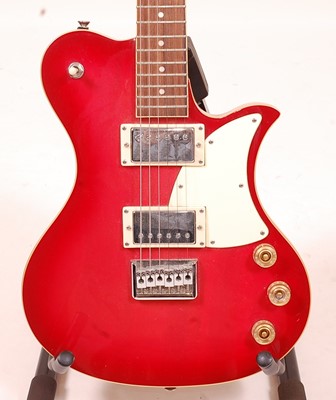 Lot 510 - A First Act ME501 electric guitar, in red...