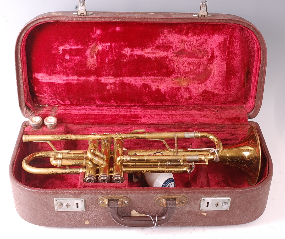 Lot 504 - A Melody Maker brass trumpet, in fitted