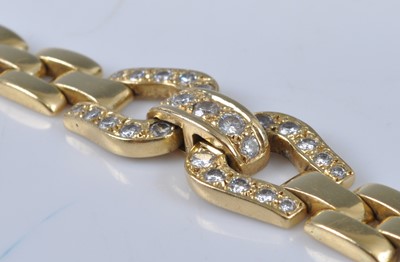 Lot 1152 - After Cartier, a yellow metal diamond bracelet,...