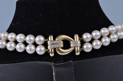 Lot 1150 - A two-row cultured Akoya pearl necklet,...