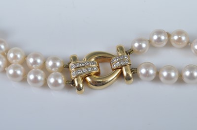 Lot 1150 - A two-row cultured Akoya pearl necklet,...