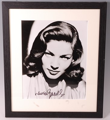 Lot 636 - Lauren Bacall, (1924-2014), a black and white...