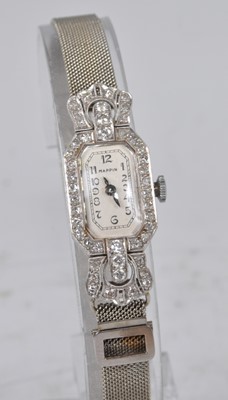 Lot 1170 - A lady's white metal and diamond 17-jewel...