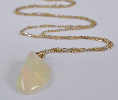 Lot 1141 - A yellow metal abstract hydrophane opal...