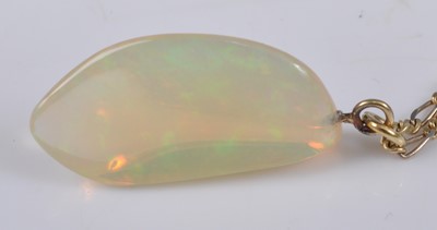 Lot 1141 - A yellow metal abstract hydrophane opal...