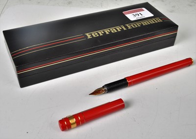 Lot 391 - A Ferrari fountain pen, in red and gilt metal...