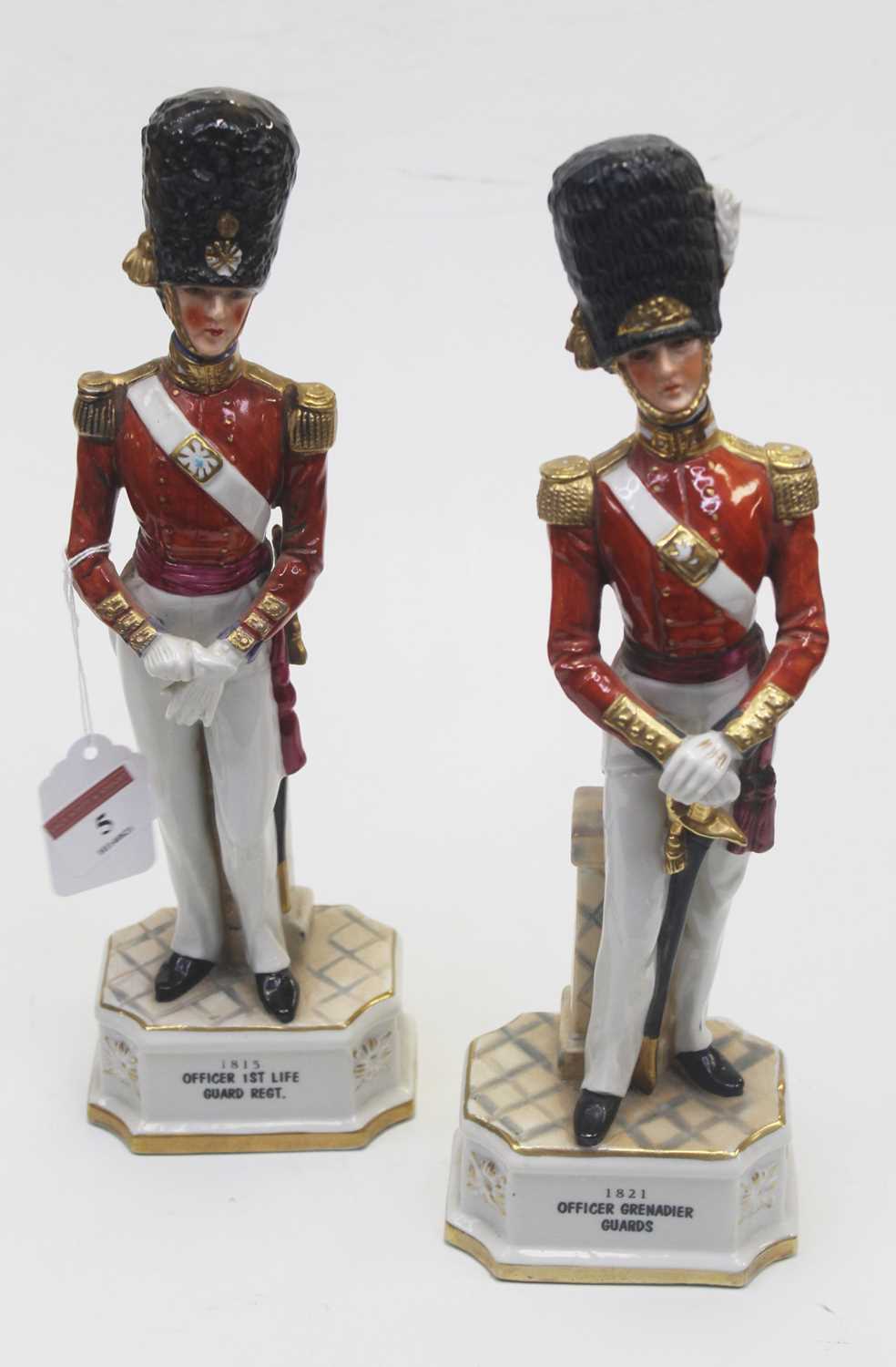 Lot 5 - A pair of Continental porcelain figures of...