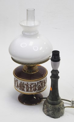 Lot 16 - A ceramic table lamp, the frieze decorated...