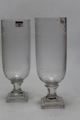 Lot 28 - A pair of modern cut glass storm lamps each on...