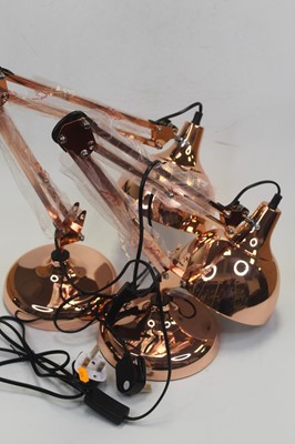 Lot 103 - A pair of modern copper effect anglepoise desk...