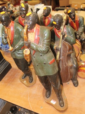 Lot 109 - A set of six modern painted resin figures of...