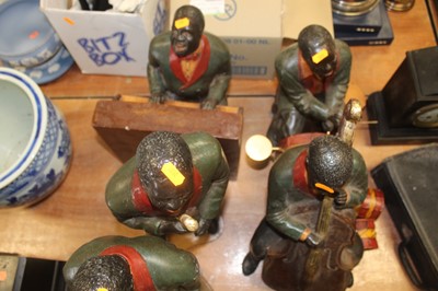 Lot 109 - A set of six modern painted resin figures of...