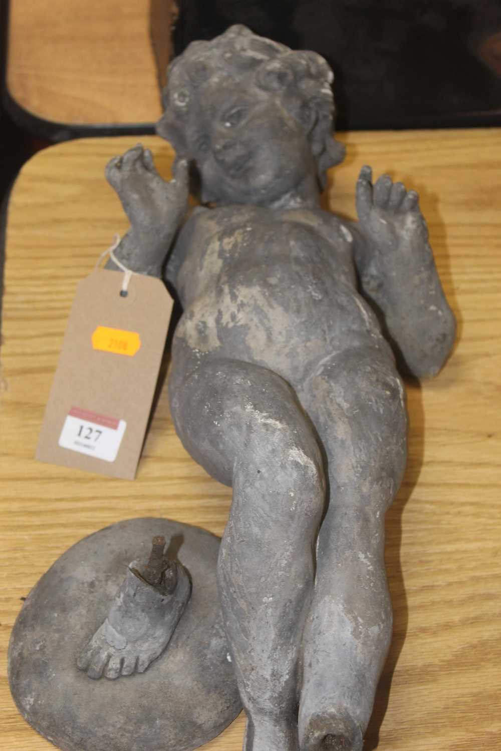 Lot 127 - An early 20th century lead figure in the form...