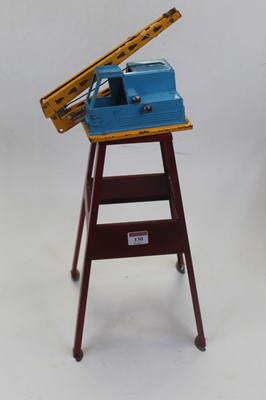 Lot 130 - A Triang Hi-way tinplate model of a crane, h.63cm