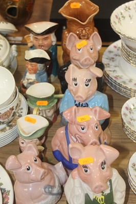 Lot 132 - A set of five Wade Natwest pig money-boxes;...