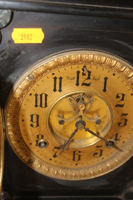 Lot 137 - A late 19th century black slate mantel clock,...