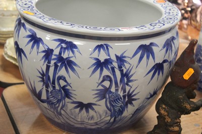 Lot 147 - A large reproduction jardiniere, blue and...