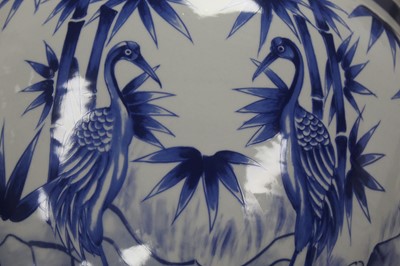 Lot 147 - A large reproduction jardiniere, blue and...