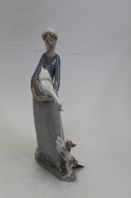 Lot 186 - A Lladro Spanish porcelain figure of a girl...
