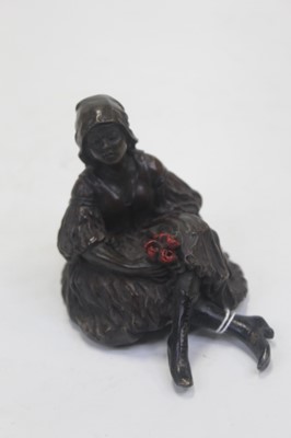 Lot 201 - A reproduction bronzed model of a young girl,...