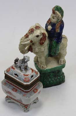 Lot 215 - A 19th century Chinese ceramic figure of a...