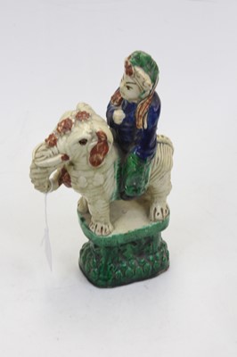 Lot 215 - A 19th century Chinese ceramic figure of a...