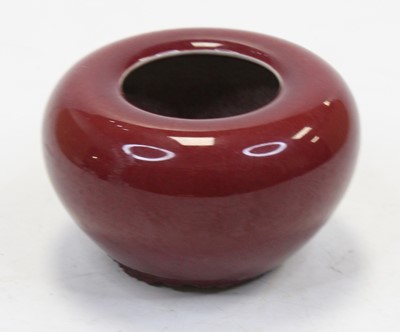 Lot 223 - A Chinese export sang-de-boeuf vase, of squat...
