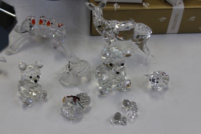 Lot 229 - A collection of Swarovski crystal ornaments,...