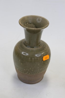 Lot 247 - A stoneware vase, of gu shape, glazed in...
