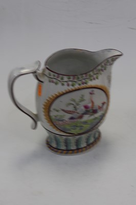 Lot 249 - A George III commemorative jug, on a white...