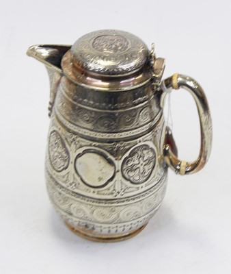 Lot 258 - A Victorian silver plated hot water pot, the...