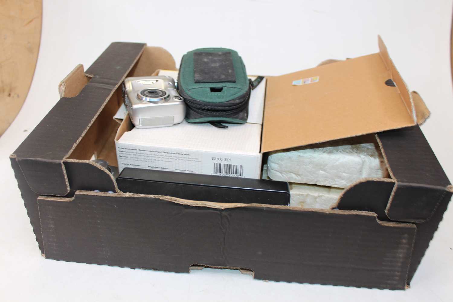 Lot 629 - A Nikon Coolpix 2100 digital camera; together...