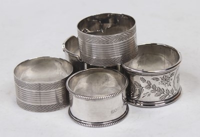 Lot 336 - A pair of 20th century silver napkin rings,...